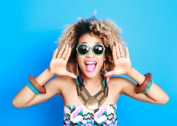Summer portrait of excited afro american young woman