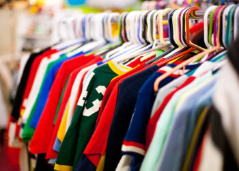 Clothing rack at a second hand store. Shot indoors with a fast 50mm lens.