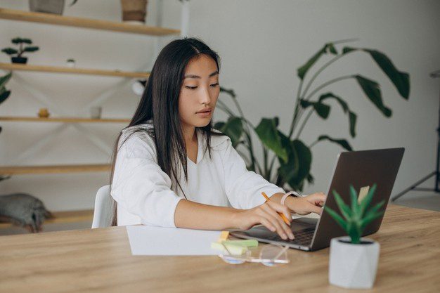 woman working computer desk from home 1303 28986