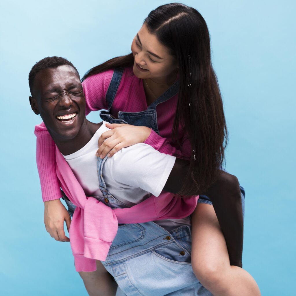 happy couple posing studio