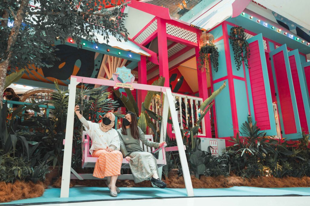 Sunway Putra Mall rumah kampung decorated with hues of pink and turqoise bringing a cheerful vibe 11zon