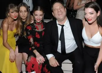Photo: Harvey Weinstein with Taylor Swift, Este Haim, Jaime King and Lorde at the Golden Globes.(News.com.au)